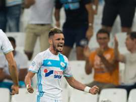 Olympique de Marseilles French midfielder Remy Cabella celebrates after scoring during the French Ligue 1 football match Olympique de Marseille versus Lorient on August 26, 2016 at the Velodrome stadium in Marseille, southern France