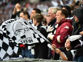 Derby County fans cheer for their team during the English Championship Play Off final football match between Derby Country and Queens Park Rangers at Wembley Stadium in London on May 24, 2014