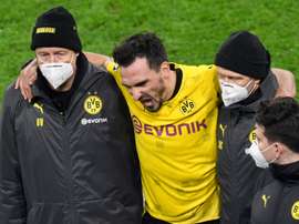 Mats Hummels (C) has shaken off an ankle injury suffered against Lazio. AFP