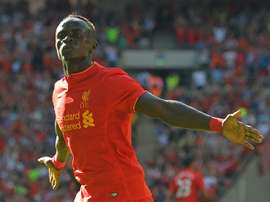 Liverpools midfielder Sadio Mane celebrates after scoring the opening goal of the pre-season International Champions Cup against Barcelona at Wembley stadium on August 6, 2016