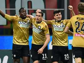 Lasagna (C) could move to Inter. AFP