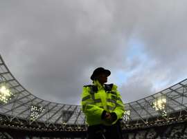 Police were hsown spraying fans at the match. AFP