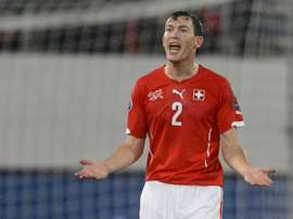 Lichtsteiner says his move to Arsenal is not yet complete. AFP