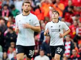 Ben Woodburn (R) made a surprising appearance for Liverpool U23s. AFP
