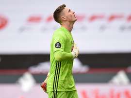 Sheffield United want Henderson back. AFP