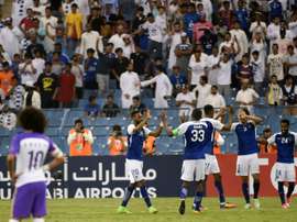 Al Hilal's players celebrate after overcoming Al-Ain on Monday. AFP