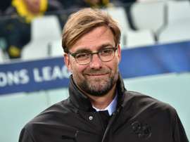 Dortmunds head coach Jurgen Klopp smiles during the UEFA Champions League round of 16 first leg football match Juventus vs Borussia Dortmund at the Juventus stadium in Turin on February 24, 2015