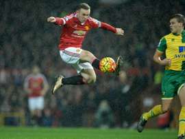 Manchester Uniteds English striker Wayne Rooney controls the ball during the English Premier League football match between Manchester United and Norwich City at Old Trafford in Manchester, north west England on December 19, 2015