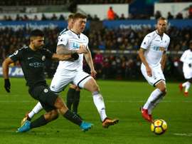 City e Swansea, frente a frente neste domingo. AFP