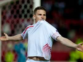 Sevillas forward Kevin Gameiro celebrates on April 14, 2016