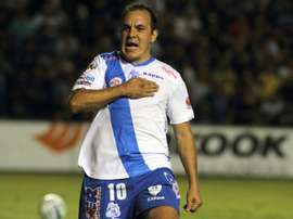 Cuauhtemoc Blanco, pictured celebrating after scoring for Puebla on September 12, 2014, retired from football in April before diving into politics