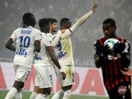 Ten-man Lyon beat Nice to move fifth in Ligue 1. AFP