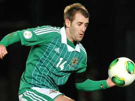 Niall McGinn has demanded that Aberdeen be treated equally to Rangers. AFP