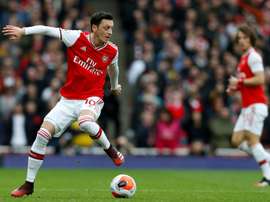 Mesut Ozil cannot play for Arsenal again until at least January. AFP
