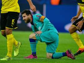 Messi returns as Dortmund rue missed chances against Barcelona. AFP