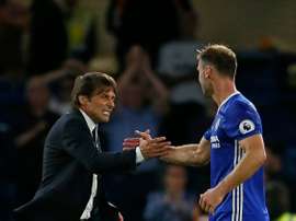 Ivanovic (R) believes that Chelsea didn't deliver for Conte. AFP
