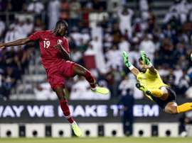 Ali (L) helped Qatar thrash Afghanistan in World Cup qualifying. AFP