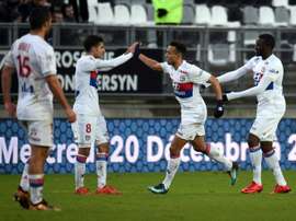 Aouar the hero as Lyon leave it late. AFP