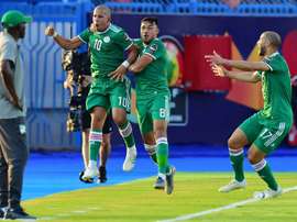Feghouli (2L) scored Algeria's goal in their penalty shootout victory. AFP