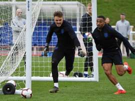 England keeper Butland joins up with Hodgson at Palace. AFP
