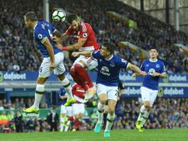 Jagielka challenges Boro's Alvaro Negredo in Everton's 3-1 win on Saturday. AFP