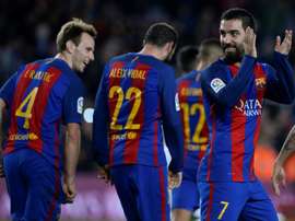 Barcelonas Turkish midfielder Arda Turan (R) celebrates after scoring during the Spanish Copa del Rey (Kings Cup) round of 32 second leg football match FC Barcelona vs Hercules CF at the Camp Nou stadium in Barcelona on December 21, 2016