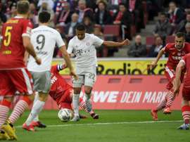 Gnabry (C) got a brace in Bayern's 1-4 win at Cologne. AFP