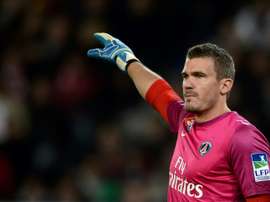 French goalkeeper Douchez handed fine after drunken rampage. AFP