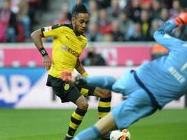 Dortmunds striker Pierre-Emerick Aubameyang (L) scores against Bayern Munich on October 4, 2015
