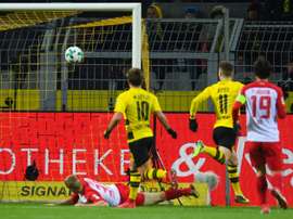 Reus strikes again as Dortmund held by Augsburg. AFP