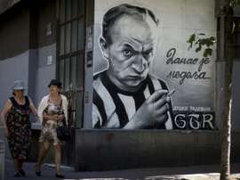 Street portraits are sprinkled across the city in Belgrade. AFP