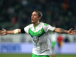 Wolfsburg's striker Max Kruse celebrates after scoring. BeSoccer