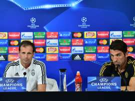 Juventus coach Massimiliano Allegri (L) and Juventus goalkeeper Gianluigi Buffon attend a press conference on the eve of the Champions League football match Juventus vs Sevilla FC at the Juventus Stadium on September 29, 2015 in Turin