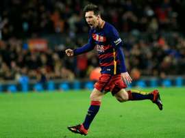 Barcelonas forward Lionel Messi celebrates after scoring during the Spanish Copa del Rey round of 16 first leg football match FC Barcelona vs RCD Espanyol at the Camp Nou stadium in Barcelona on January 6, 2016