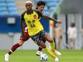 Guangzhou won. AFP