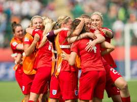 England Lionesses need to push to next level says manager Phil Neville. AFP