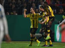 Dortmund set up semi-final against Bayern.