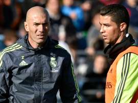 Zinedine Zidane (left) pictured with Cristiano Ronaldo during his first training session as coach of Real Madrid at the Alfredo di Stefano stadium in Valdebebas, on the outskirts of Madrid, on January 5, 2016