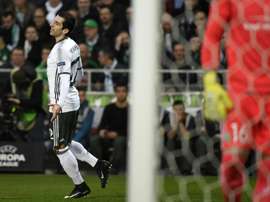 Bukharov cancels out Mkhitaryan in last-16 tie. AFP