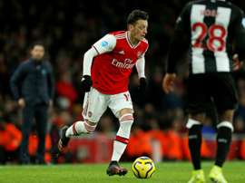 Ozil has sat down with Arsenal to negotiate his new contract. AFP