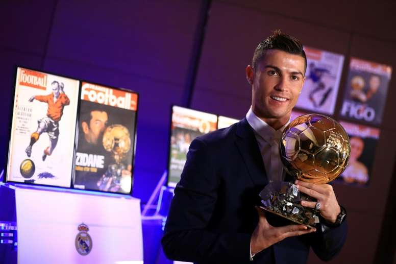 Real Madrids forward Cristiano Ronaldo and team mates -- to be the target of a crocodile -- Kashima Antlerss defender Naomichi Ueda