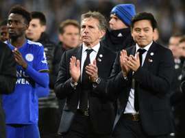 Leicester City manager Claude Puel (centre) applauds fans after Burnley draw. AFP