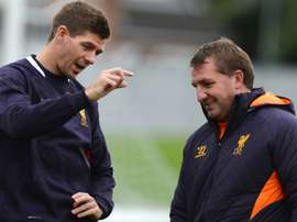 Gerrard (L) is in contact with the League One club. AFP