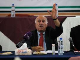 Palestinian Football Association (PFA) President Jibril Rajoub speaks during a meeting in the Israeli occupied city of Hebron announcing a decision to postpone a rare match between teams from the Gaza Strip and the West Bank, on July 30, 2016