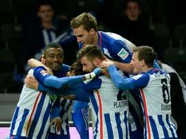 Herthas forward Salomon Kalou (L) celebrates with his teammates (from L) Genki Haraguchi, Sebastian Langkamp, Marvin Plattenhardt and Vladimir Darida after scoring during a Bundesliga football match against Mainz on December 20, 2015