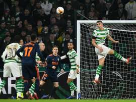 Lille would like to buy Simunovic (R) off Celtic. AFP