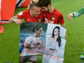 Pato showed his affection through a poster. AFP