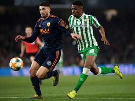 Valencia will take two away goals back to the Mestalla. AFP