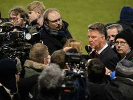 Manchester United beat Shrewsbury in the FA Cup but manager Louis van Gaal (R) remains a man facing problems