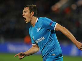 Zenits Russian forward Artem Dzyuba celebrates a goal during a UEFA Champions League group H football match against Gent at the Petrovsky stadium in St. Petersburg on September 29, 2015